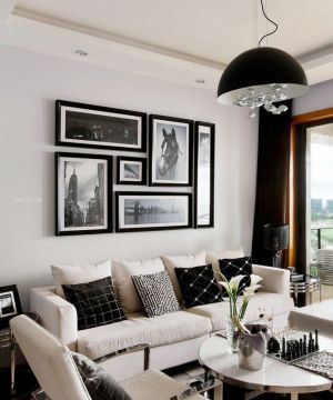 2023特色现代风格客厅沙发背景墙挂画装修图片