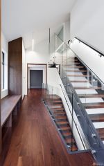 现代公司楼梯间深棕色地板装修设计效果图