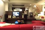 家装客厅深棕色木地板设计图