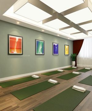 2025最新简约风格瑜伽会所绿色墙面装饰图