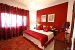 时尚绚丽宾馆室内红色窗帘装修效果图